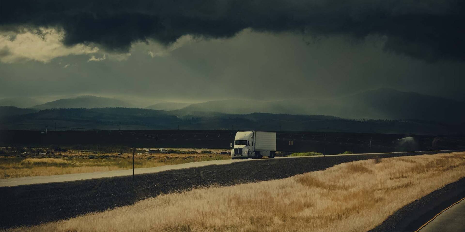 Logistics Truck on Stormy Road